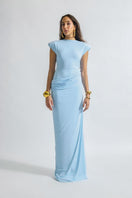 Deme by Gabriella CULT MIA X DEME maxi dress in flowing fabric with floral print and sleeveless design on a model.