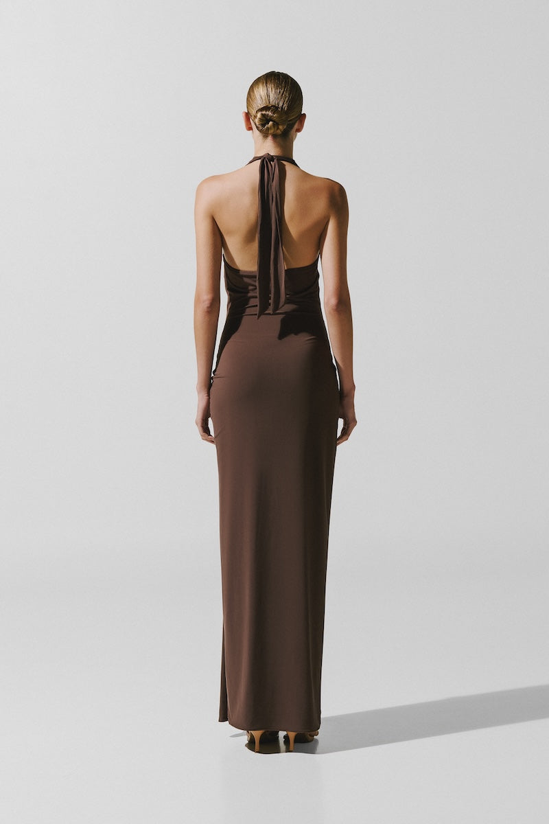 Baobab Donatella Maxi Dress in Moca color, flowing fabric, and elegant design, perfect for stylish summer occasions.