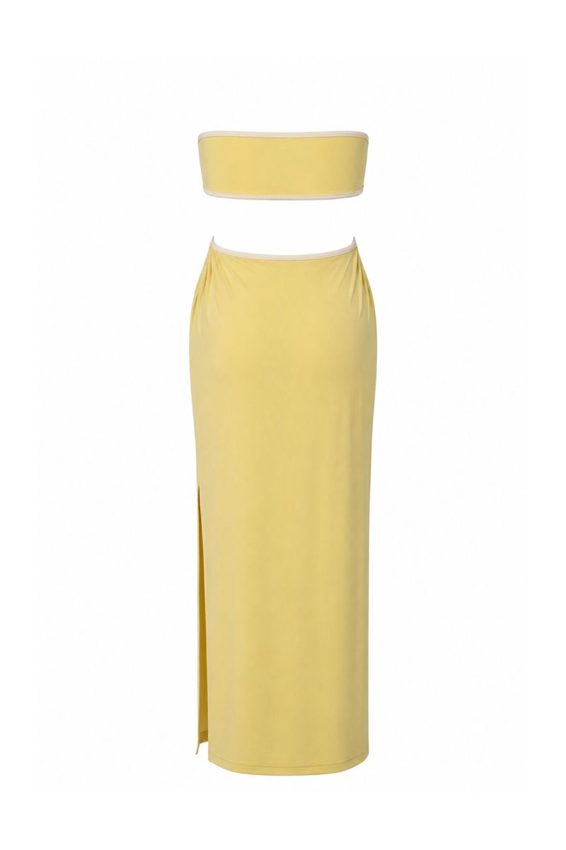 Bright yellow Baobab Mambo maxi dress with flowing fabric and sleeveless design, perfect for summer occasions.
