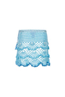 Andreeva handmade aqua marine mini crochet skirt with intricate detailing, perfect for casual or summer wear.