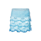 Handmade aqua marine mini crochet skirt by Andreeva, featuring intricate crochet details and a stylish, fitted design.