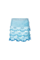 Handmade aqua marine mini crochet skirt by Andreeva, featuring intricate crochet details and a stylish, fitted design.