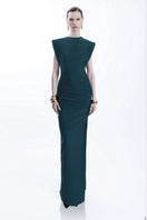 LEDIEL MOCCA LARGO Emerald gown with flowing fabric and elegant design, showcased on a mannequin.