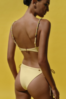Baobab ITALA bikini bottom in butter color, showcasing the stylish, comfortable swimwear design with smooth fabric and clean lines.