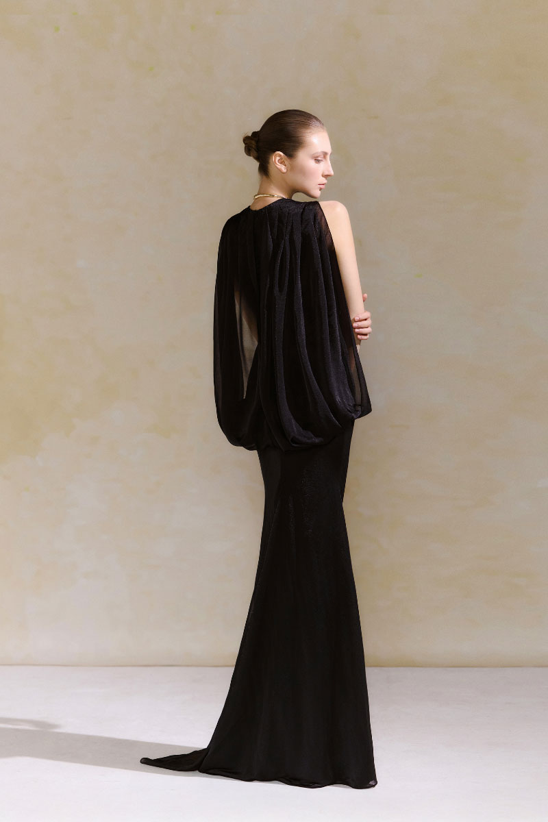 Arti Apparel Calla Maxi Dress featuring a flowing silhouette and elegant design, perfect for summer or special occasions.