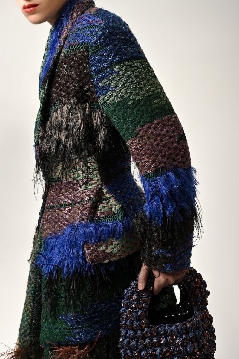Lalo feather jacket in multi-color with a stylish, textured design and lightweight, cozy fit.