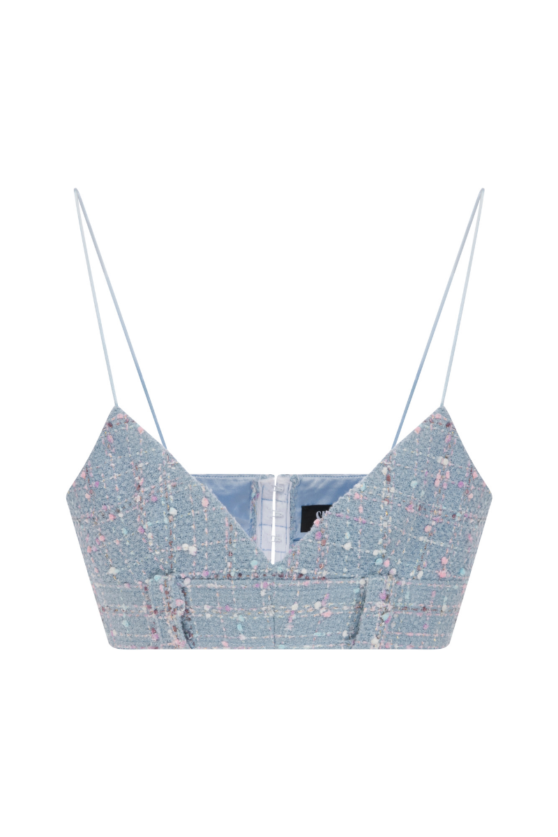 Sudi Etuz tweed crop top with short sleeves and fitted design, featuring a classic textured tweed fabric.