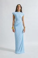 Deme By Gabriella CULT MIA X DEME maxi dress, long flowing design with vibrant patterns, on a mannequin.