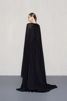 Black chiffon gown with a gold belt from CEM, featuring flowing fabric and elegant design perfect for formal occasions.