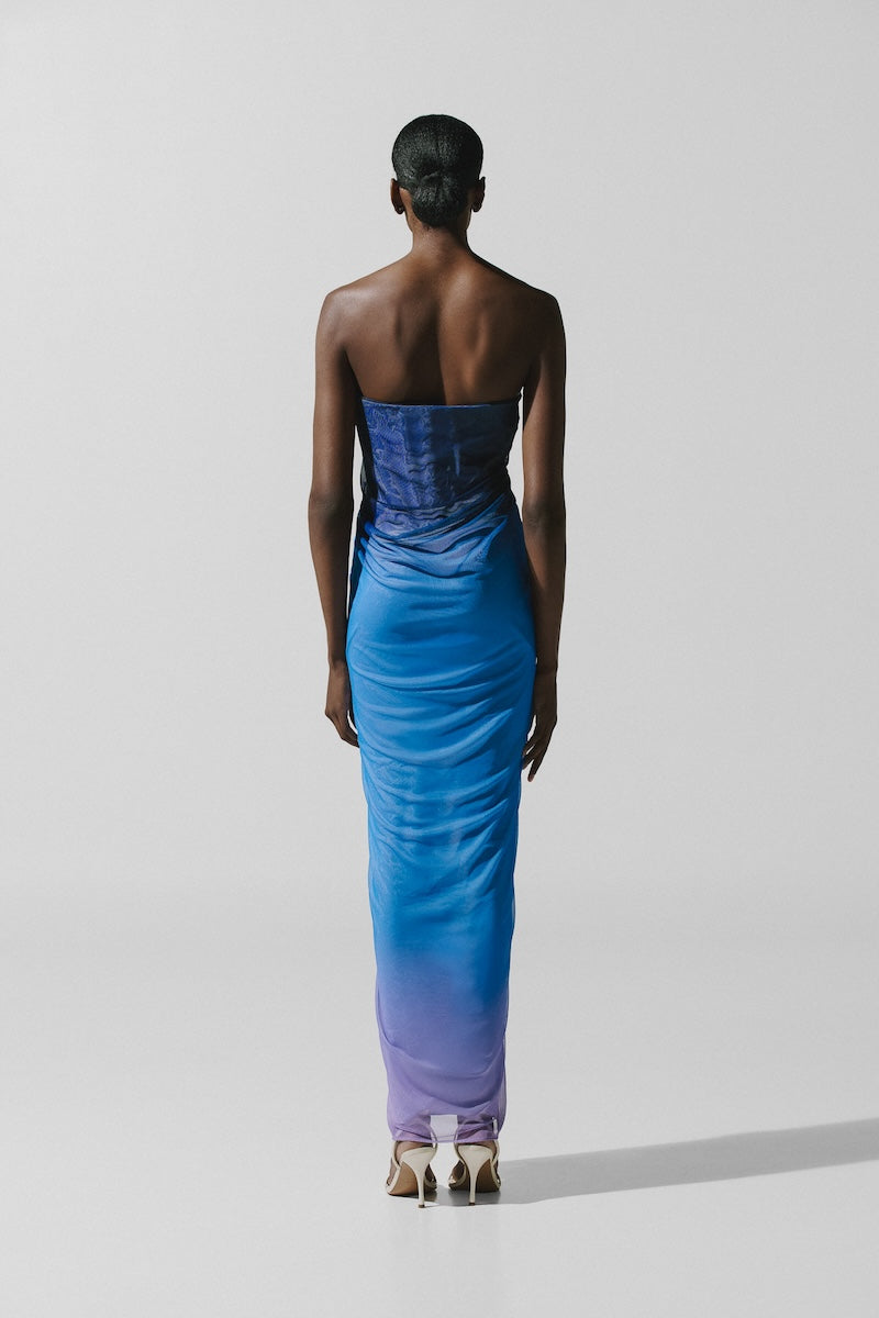 Baobab Lena maxi dress in Tramonto Blu, flowing fabric, sleeveless design, and elegant style perfect for summer wear.