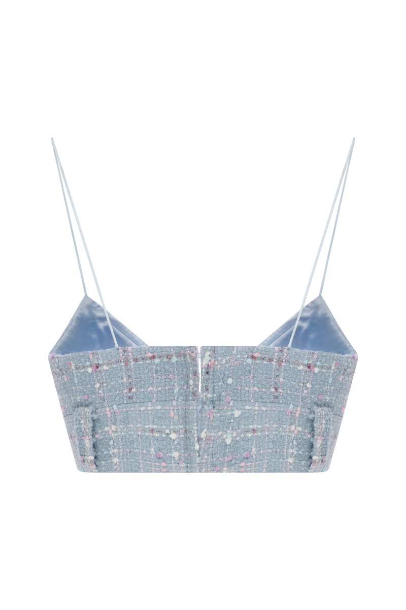 Sudi Etuz tweed crop top featuring a stylish, textured pattern, short sleeves, and a fitted design for a fashionable look.