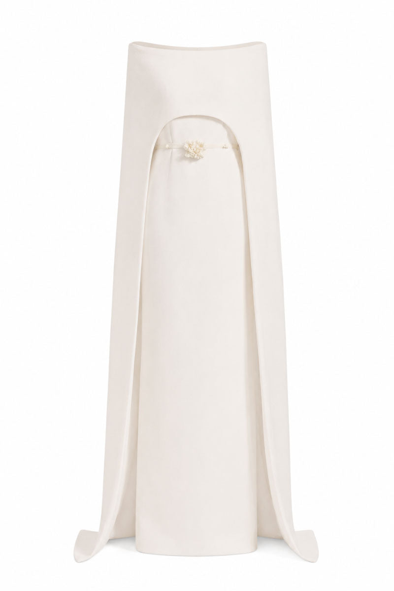 White Plan Legacy Dress gown with elegant fabric and classic design, showcased on a mannequin in a well-lit setting.