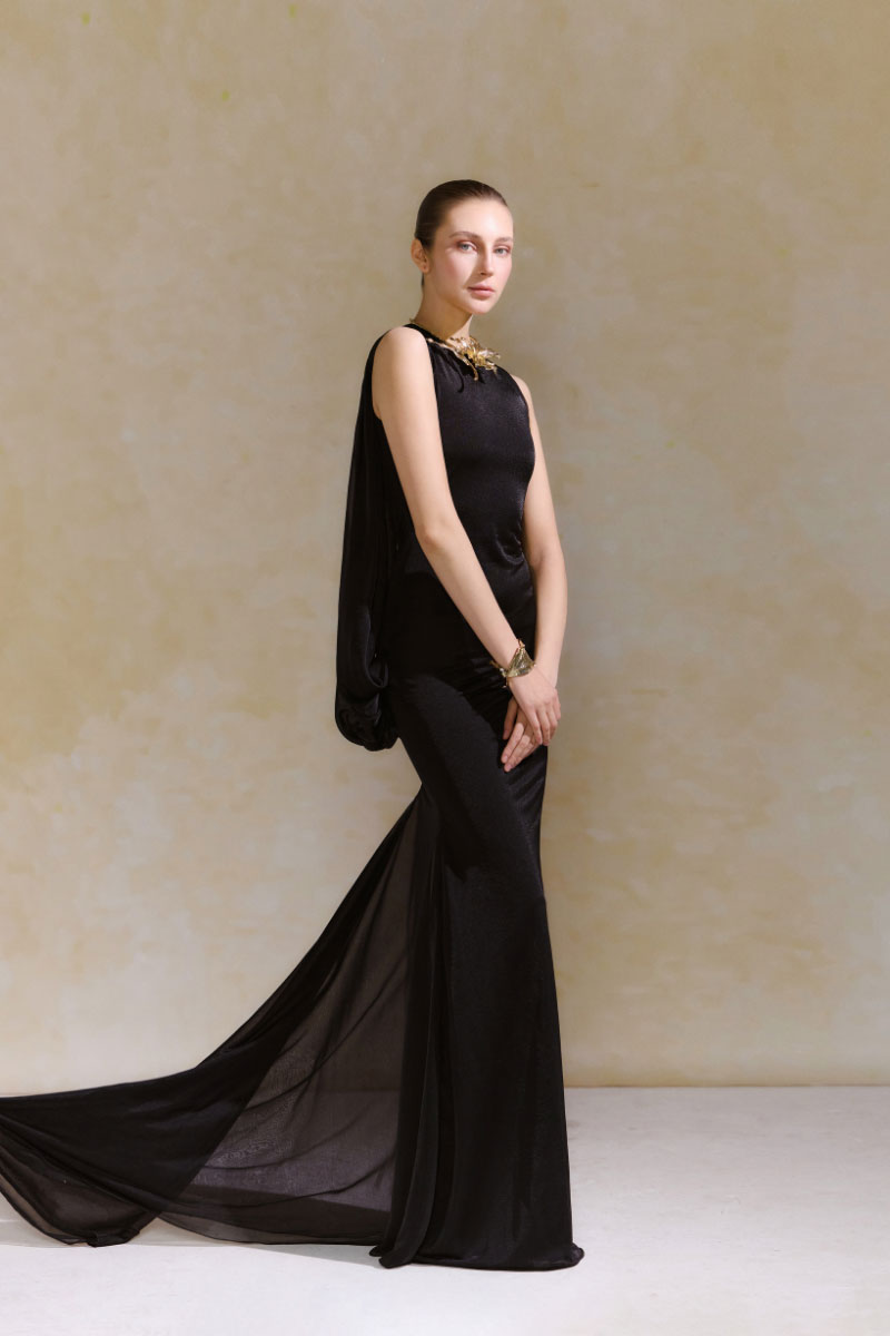 Arti Apparel Calla Maxi Dress featuring a flowing design and elegant silhouette, perfect for summer or special occasions.