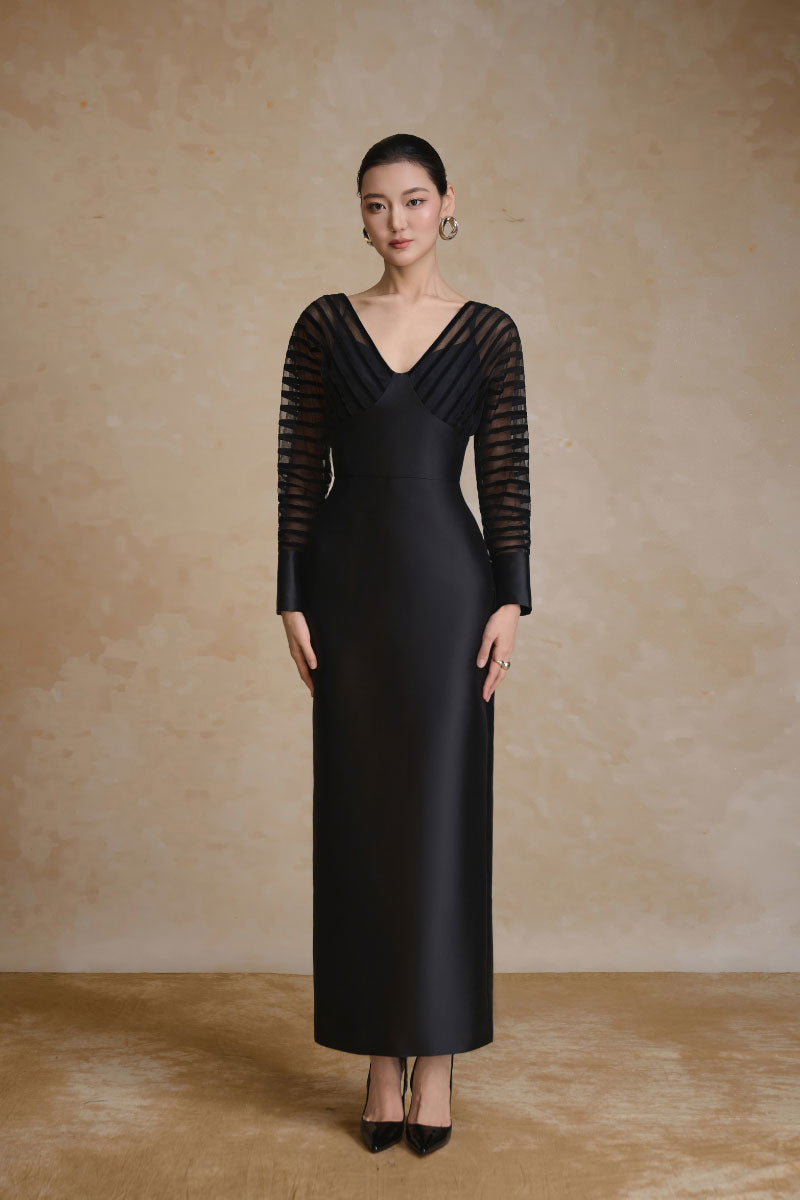 Elegant Tracy Dress gown by Arti Apparel featuring flowing fabric and stylish design, shown on a mannequin.