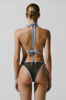 Baobab Helena bikini top in Moca Blu, stylish swimwear with adjustable straps and vibrant blue color for beach and pool.