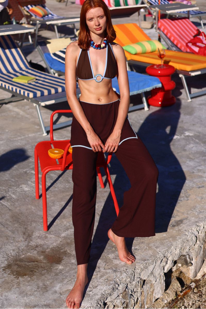Baobab Helena bikini top in Moca Blu with adjustable straps and tropical print, perfect for beach or pool days.