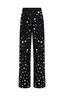 Sudi Etuz mirror-covered straight cut pants with reflective surface, stylish and modern design, shown on a model.