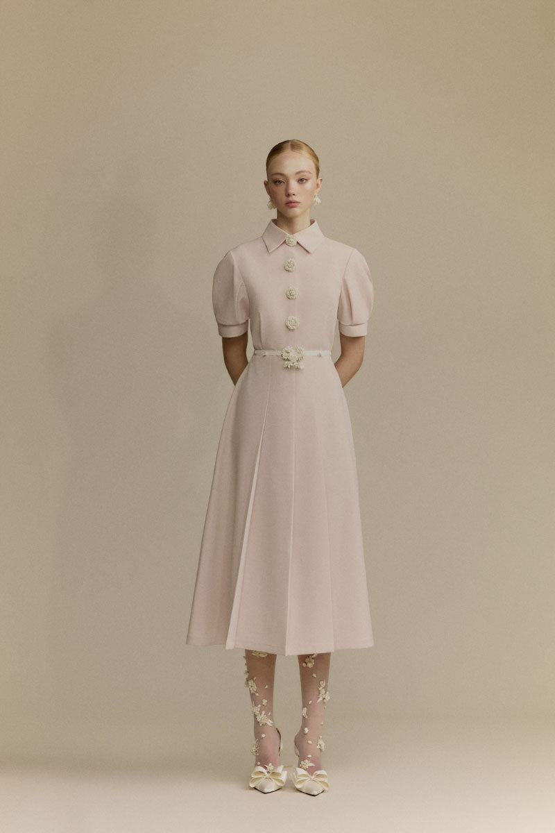White Plan Quincy midi dress with a flowing silhouette, featuring elegant fabric and stylish design.