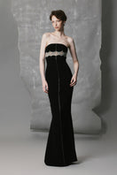 Elegant black Phan Huy gown with a straight silhouette and intricate bead detailing, perfect for formal occasions.