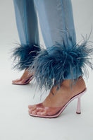 Kolane Margot Mule heels in rose pink transparent with open toe and elegant strap design on a white background.