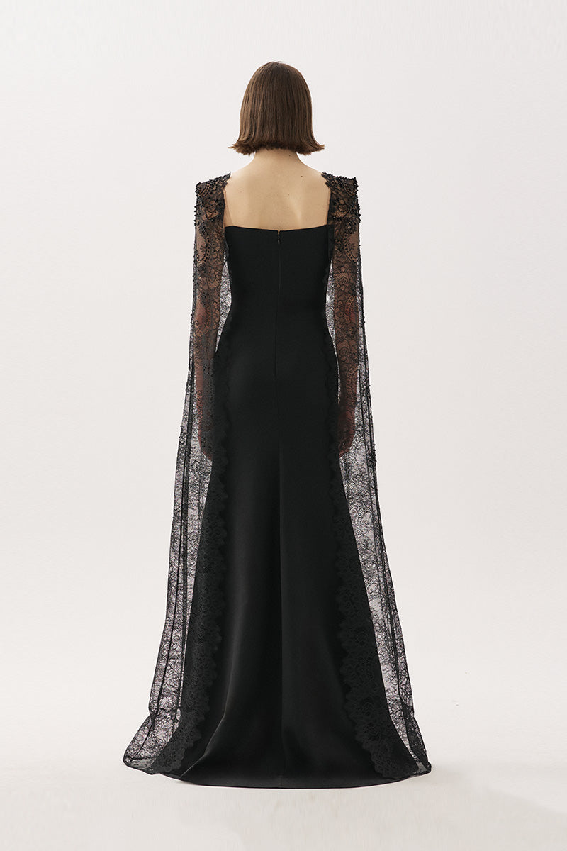 Black Maxi Dress by Tarık Ediz featuring a flowing silhouette and elegant design, perfect for formal occasions.