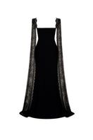 Black Tarık Ediz gown with elegant flowy fabric and intricate detailing, perfect for formal occasions.