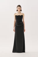 Black Tarık Ediz Gladys gown with elegant draping and long sleeves, showcased on a mannequin.