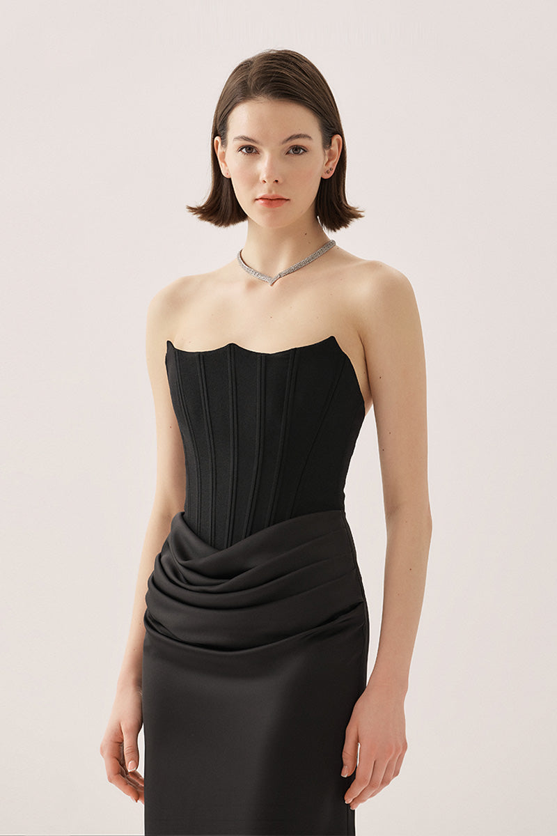 Black Gladys Maxi Dress by Tarık Ediz featuring a flowing silhouette and elegant design, displayed on a mannequin.