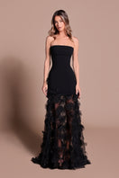 Elegant black Wisteria gown by Tarık Ediz, front view showcasing flowing fabric and stylish design details.