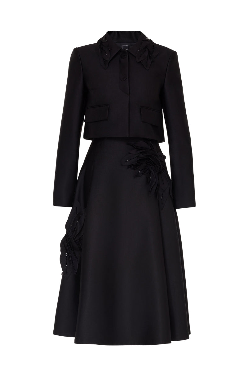 Black Agatha co-ords set by Tarık Ediz displayed on a ghost mannequin, showcasing stylish matching top and pants.