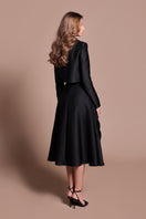 Tarık Ediz Agatha black co-ord set displayed from the back, featuring a stylish, fitted design with matching top and bottoms.