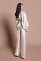 Tarık Ediz MADDIE Vanilla co-ord set shown from the back, featuring a stylish matching top and pants ensemble.