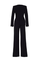 Black IRENI jumpsuit by Tarık Ediz displayed on a ghost mannequin, showing the back view with sleek, fitted design.