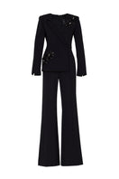 Black Tarık Ediz IRENI jumpsuit displayed on a ghost mannequin, showcasing the front view of this stylish one-piece outfit.