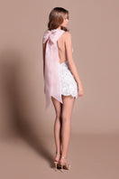 Back view of a Michele ivory mini dress by Tarık Ediz, featuring elegant fabric and stylish design details.