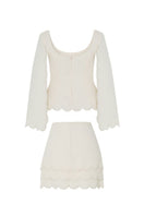 Tarık Ediz BOLYN vanilla co-ords set on mannequin, featuring a stylish matching top and pants ensemble.