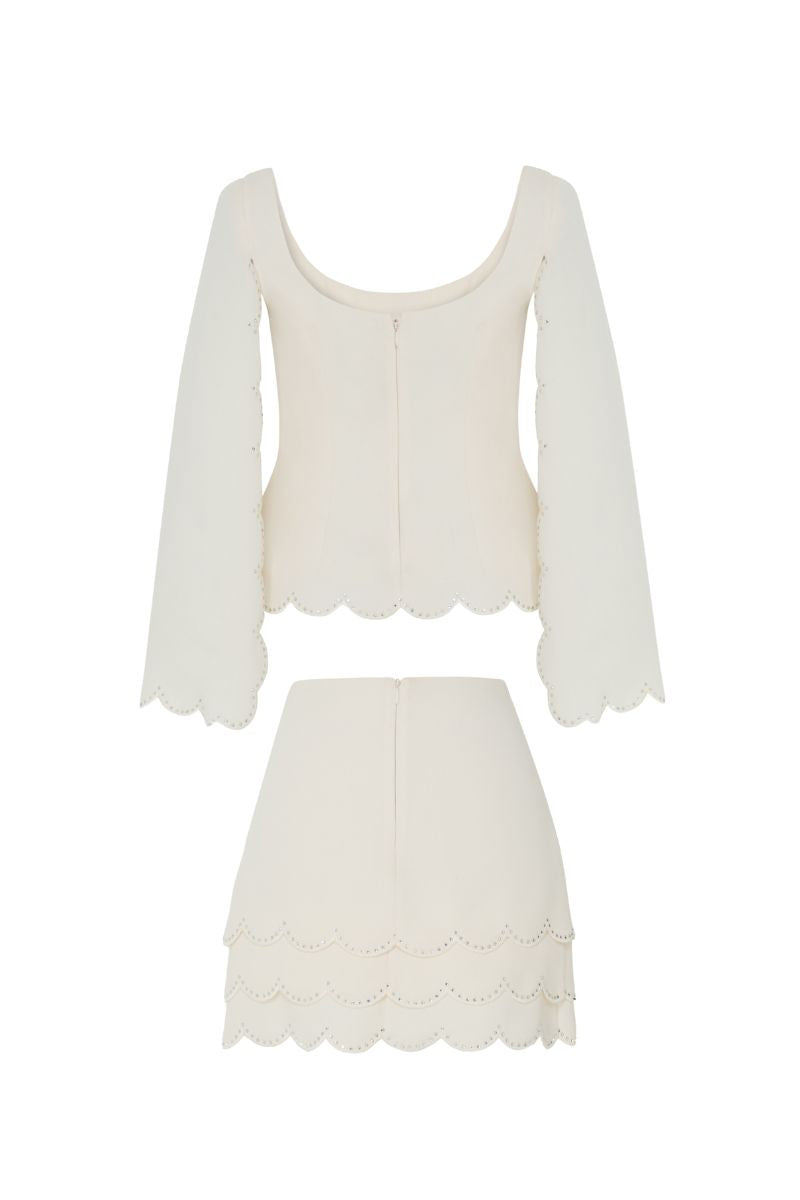 Tarık Ediz BOLYN vanilla co-ords set on mannequin, featuring a stylish matching top and pants ensemble.