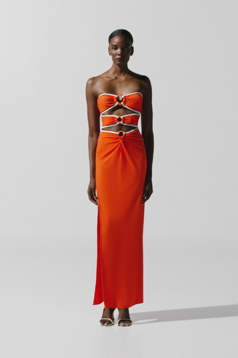 Baobab ZUR Maxi Pareo in Campari, a stylish cover-up with vibrant red fabric and flowing design, perfect for beach or poolside wear.