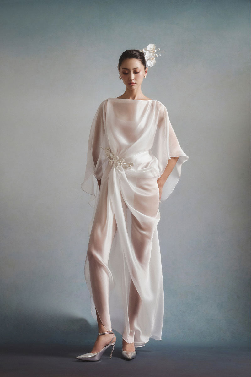 White Plan Aurelia draped maxi dress featuring flowing fabric and elegant design, perfect for stylish summer occasions.