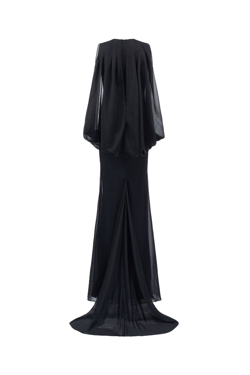 Arti Apparel Calla Maxi Dress featuring a flowing fabric and elegant design, perfect for summer or special occasions.