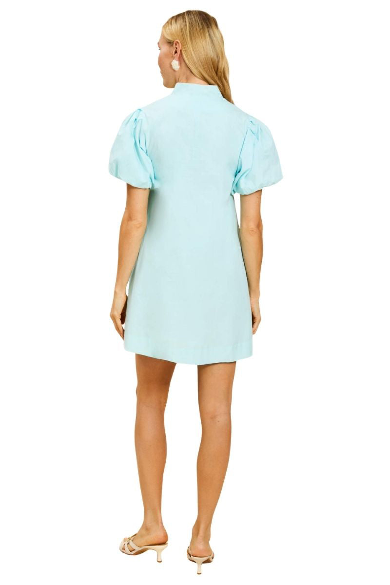 Mestiza New York Ellianna mini dress in Sorrento Citrus featuring vibrant citrus print and sleeveless design on model.