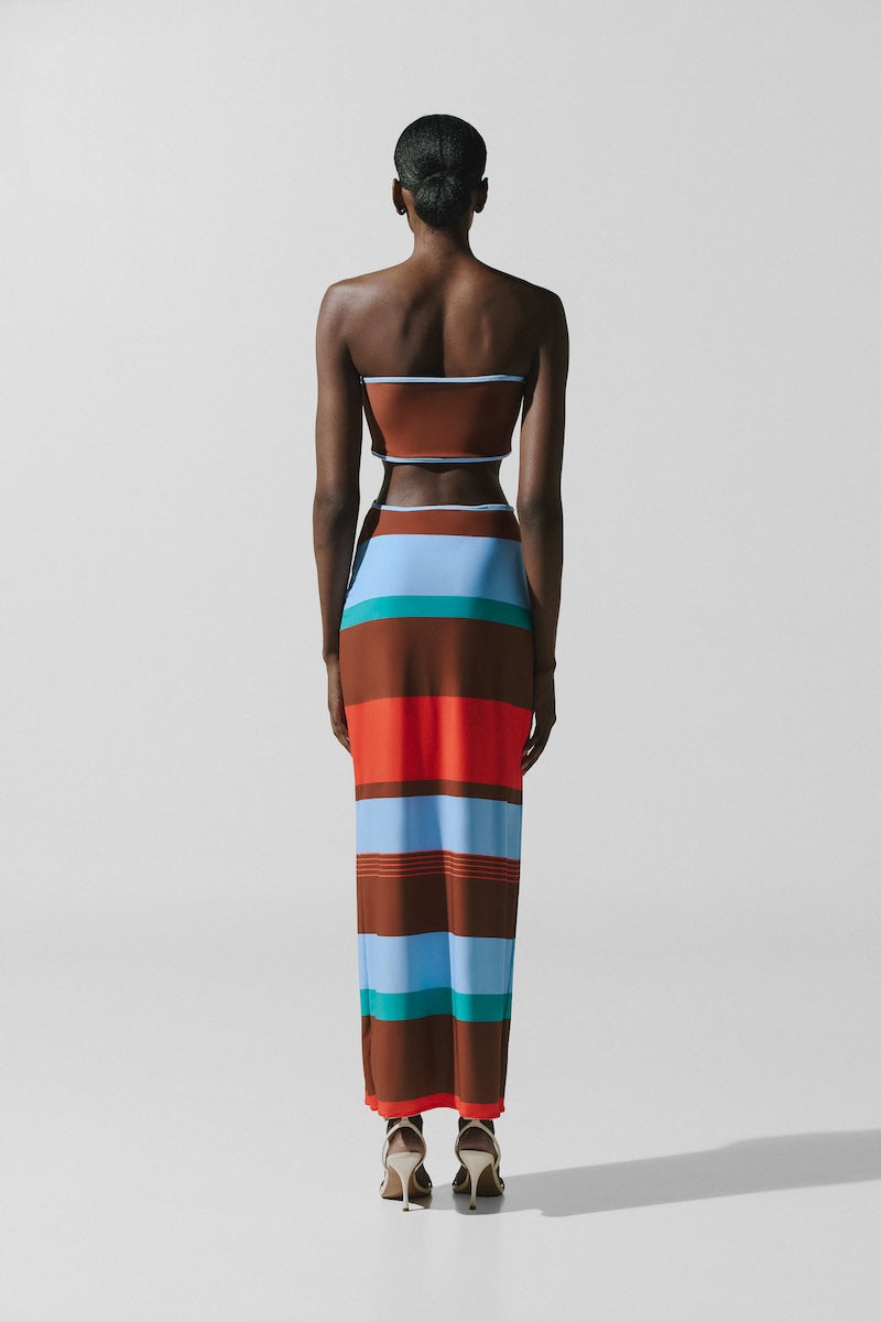 Baobab Mambo Maxi Dress in Funky Aperol, vibrant flowy maxi dress with bold floral pattern, casual summer style.