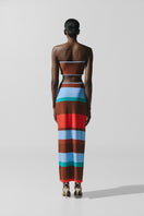 Baobab Mambo Maxi Dress in Funky Aperol, vibrant flowy maxi dress with bold floral pattern, casual summer style.