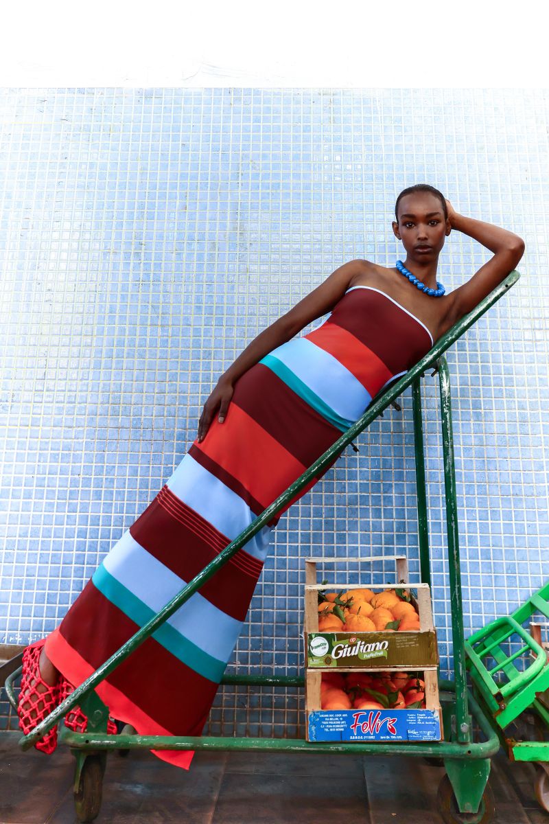 Baobab Mambo Maxi Dress in Funky Aperol color, flowing design with vibrant patterns, perfect for casual or summer wear