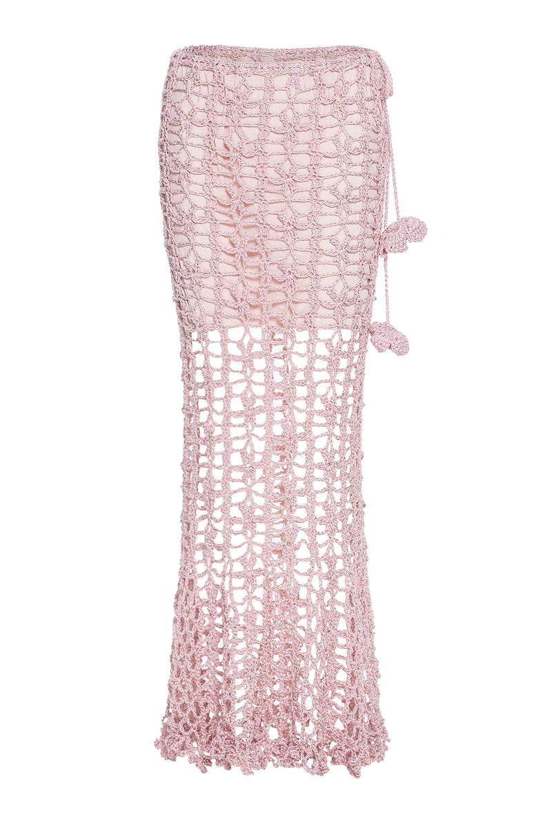 Pink vanilla handmade knit midi skirt by Andreeva, featuring soft knit fabric and a stylish, flowing design.