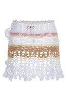 Multicolor handmade crochet mini skirt by Andreeva featuring vanilla tones and intricate stitch details.