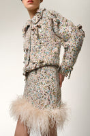 Lalo multi-colored cardigan with bows, featuring a cozy knit design and decorative bow accents, perfect for casual wear.