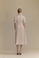 White Plan Quincy midi dress, stylish sleeveless dress with a flowy silhouette, perfect for casual or semi-formal occasions.