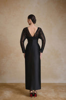 Elegant Tracy gown by Arti Apparel featuring flowing fabric, intricate details, and a stylish silhouette for formal occasions.