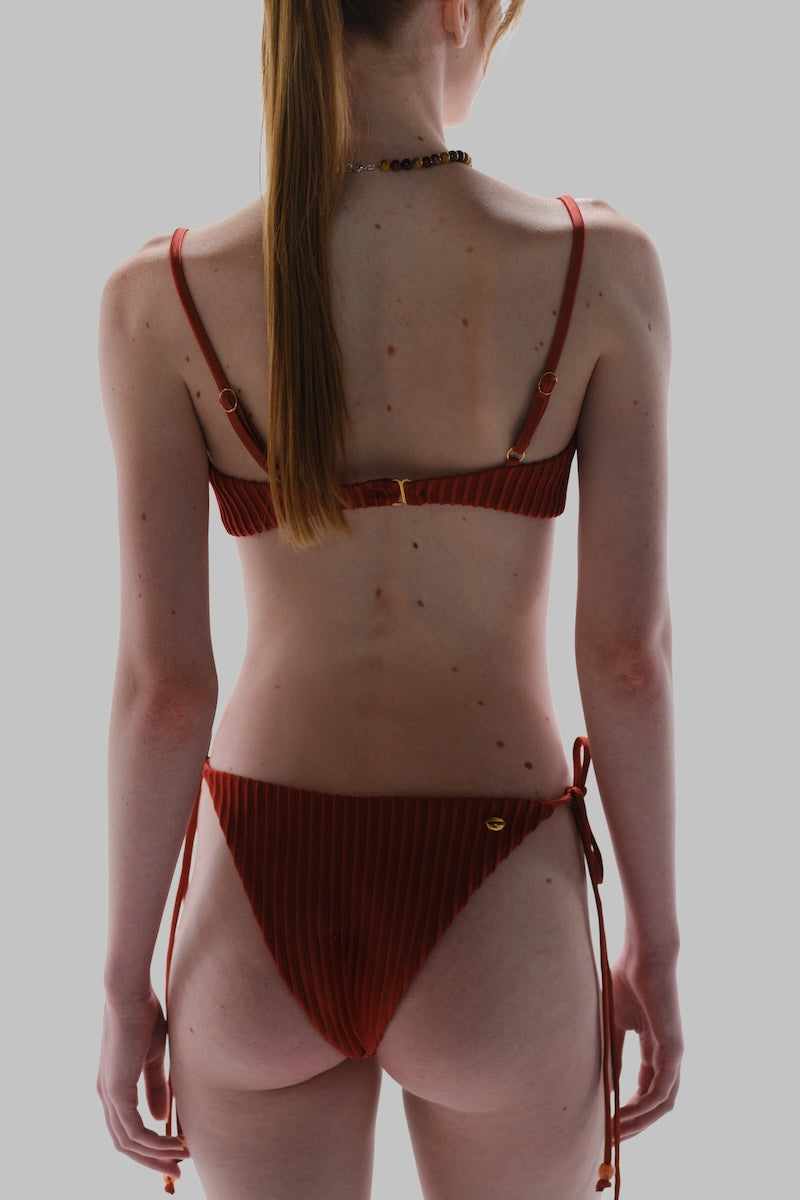 Baobab Roma bikini bottom in vibrant fabric, featuring a sleek design and comfortable fit for beach and pool wear.